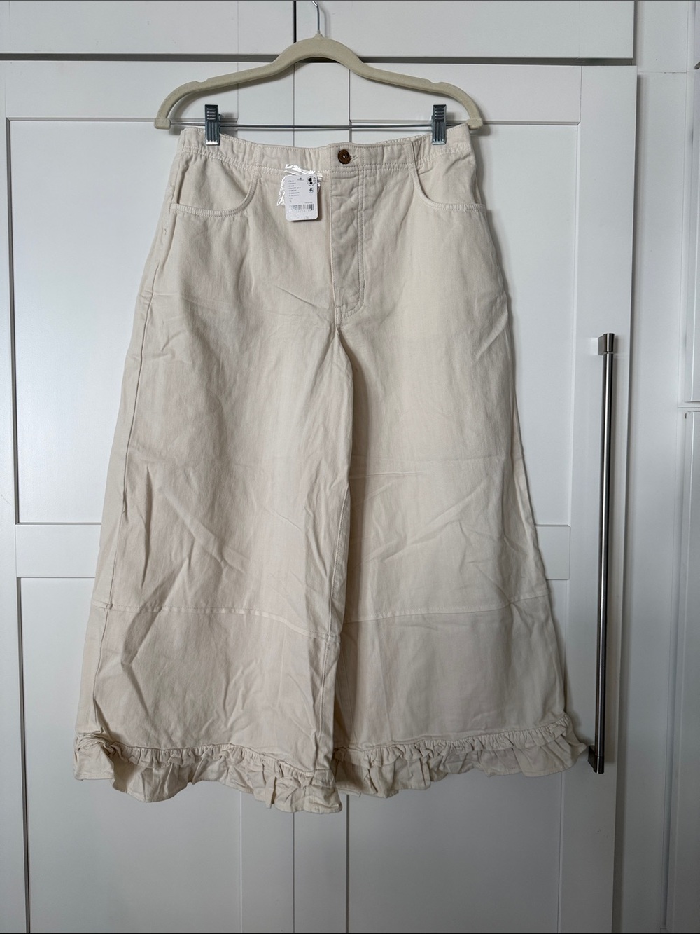 We The Free Cream Ruffle-Hem Wide Leg Jeans